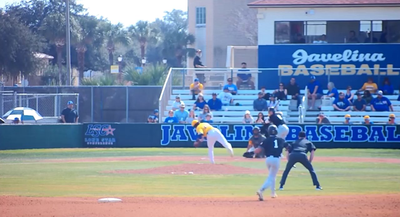 Pitcher mid-delivery during an M4P training session